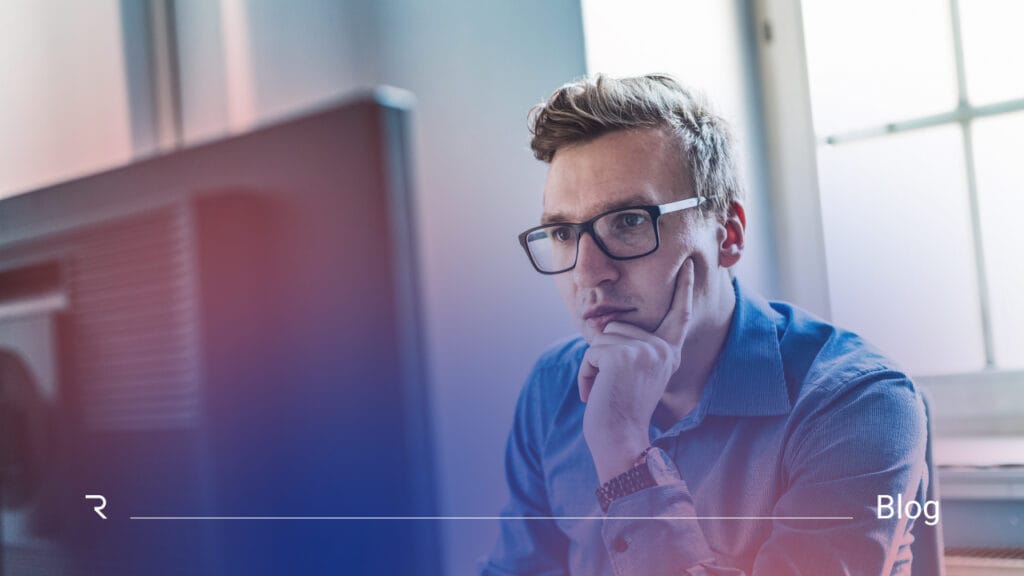 Professional man in office thoughtfully considering identity governance and access management strategy